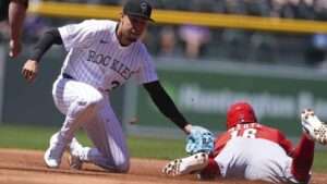 Noelvi Marte remolcó tres vueltas y Rojos apalearon a Rockies