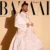 Bad Bunny posa con un vestido para Harper’s Bazaar